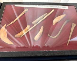 Assorted Native American bone artifacts, Scioto County Ohio, display case