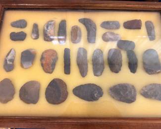Native American ground stone celts and axe heads, display case
