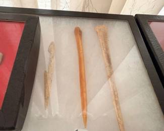 Native American bone awls and pins, display case