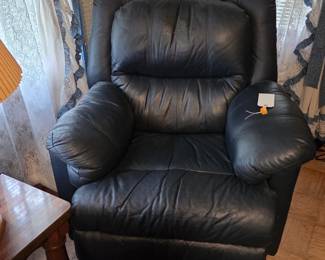 Comfortable blue leather rocker recliner