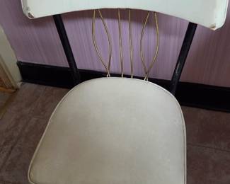 Closeup of chair that goes with kitchen formica table