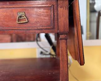 Hepplewhite Style Drop Leaf Buffet with Shelf and Two Drawers. Had Brass Pulls. Measures 60" W as Picture. With Both Leaves Down 38.5" W x 18" D x 29" H. Photo 2 of 5.