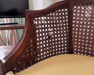 Cane Frame Settee / Bench. Significant Fading on Cushion. Cane Needs Repair. Measures 43" W x 23" D with 18" Seat Height.  Photo 3 of 5. 