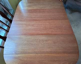 Drop Leaf Extension Drop Leaf Dining Table. Measures 60" W as Pictured. With Both Leaves Down, Table Measures 38.5" W x 18" D x 29" H. Photo 2 of 3. 