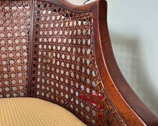 Cane Frame Settee / Bench. Significant Fading on Cushion. Cane Needs Repair. Measures 43" W x 23" D with 18" Seat Height.  Photo 4 of 5. 