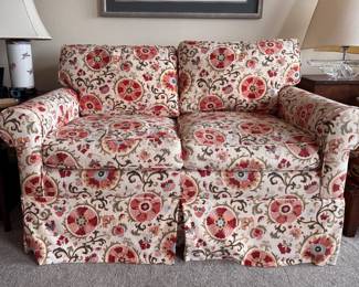Brunschwig & Fils Dzhambul In Raspberry & Orange Colorway Upholstered Loveseat with Down-Filled Cushions. Measures 58" W x 36" D. Photo 1 of 2. 