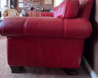 Red Leather Upholstered Three-Seat Sofa. Measures 88" W x 40" D. Photo 3 of 4. 