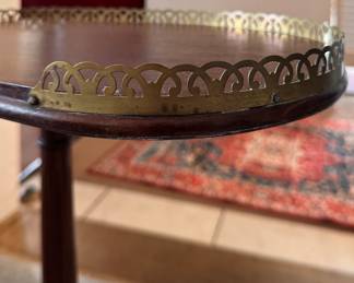 Kidney Shape Side Table with Brass Gallery. Measures 20" W x 12" D x 20" H to Top of Gallery. Photo 2 of 5.