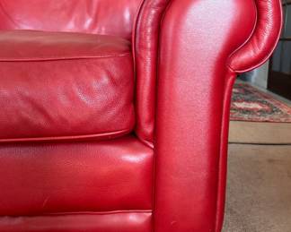 Red Leather Upholstered Three-Seat Sofa. Measures 88" W x 40" D. Photo 2 of 4. 