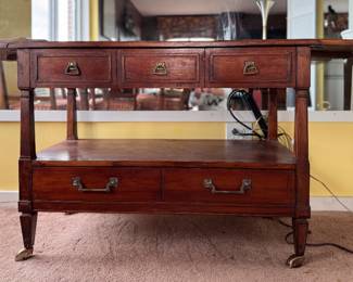 Hepplewhite Style Drop Leaf Buffet with Shelf and Two Drawers. Had Brass Pulls. Measures 60" W as Picture. With Both Leaves Down 38.5" W x 18" D x 29" H. Photo 1 of 5.  