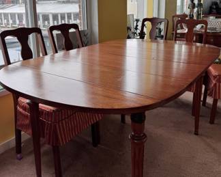 Drop Leaf Extension Drop Leaf Dining Table. Measures 60" W as Pictured. With Both Leaves Down, Table Measures 38.5" W x 18" D x 29" H. Photo 1 of 3. 