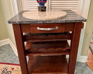 Granite top serving wine cart.