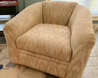Rowe upholstered barrel chair.