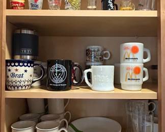 Assorted Commemorative Mugs, Glasses, and YETI Tumbler
