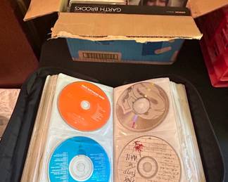 Assorted Music CDs Collection with Binder