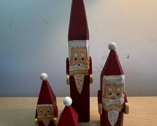Set of Four HandCarved Wooden Santa Claus Figurines