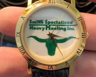 Smith Specialized Heavy Hauling Inc. Logo Watch