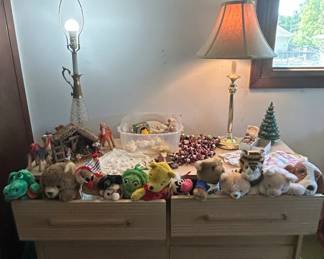 MidCentury Modern Dresser with Assorted Plush Toys and Christmas Decorations