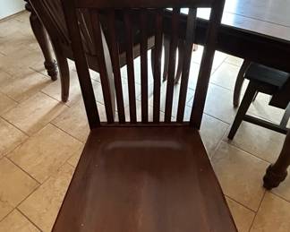 Dark Stained Wooden Dining Table and Chairs Set second image