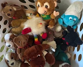 Assorted Stuffed Animals including Smurf, Monkey, and Dogs