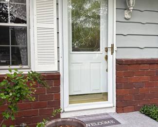 White Exterior Door with Oval Decorative Glass