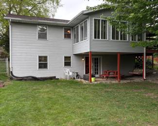 Residential House with Sunroom and Deck
