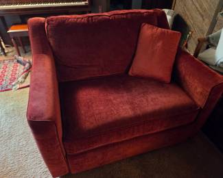 Red Velvet Armchair with Decorative Pillow