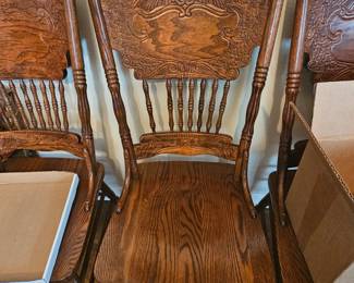 6 Oak pressed back chairs