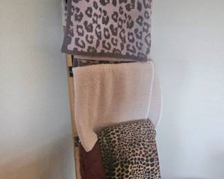 quilt ladder and blankets
