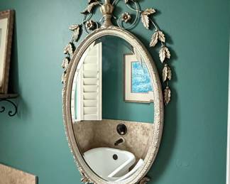 s Turner Mfg. Co. Rococo Styled Oval Mirror with Fleur de Lis