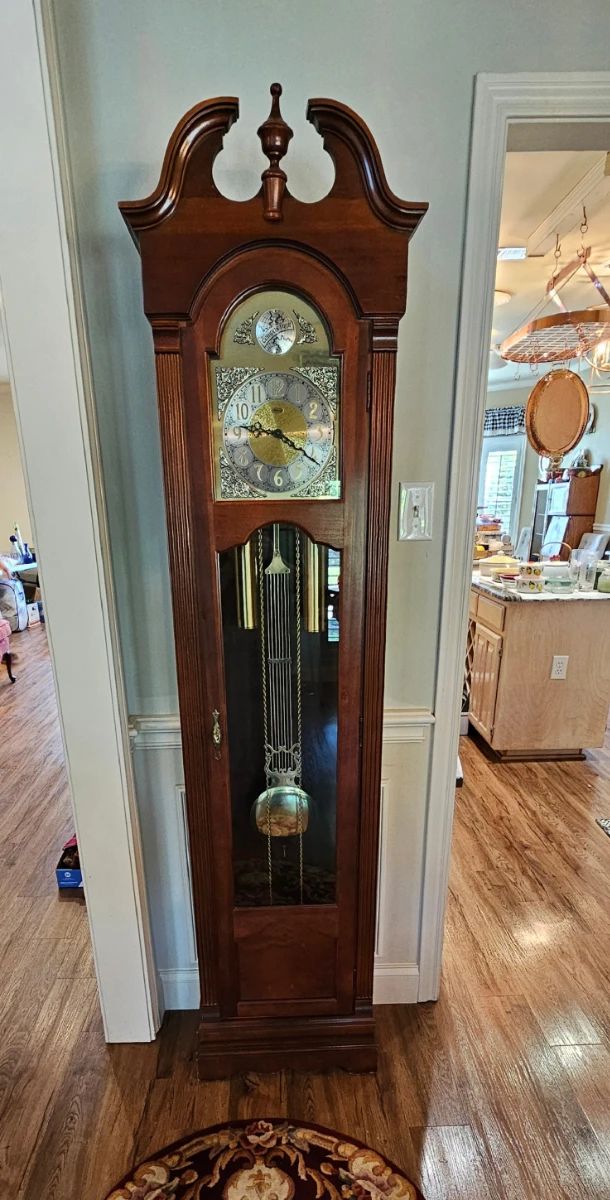 Ridgeway grandfather clock.  Owners manual is inside.