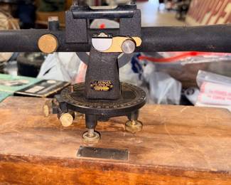 Antique transit for a surveyor