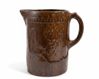 Bennington Rockingham Glaze Pitcher with Embossed Floral Design