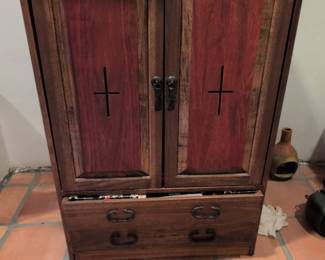 Rustic Wooden Armoire with Cross Motif Doors and Drawer
