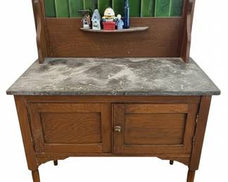 Antique Washstand with Marble Top and Green Tile Backsplash