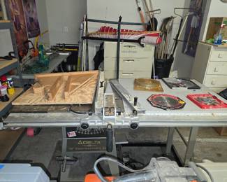 This table saw is huge!!  Great workspace!