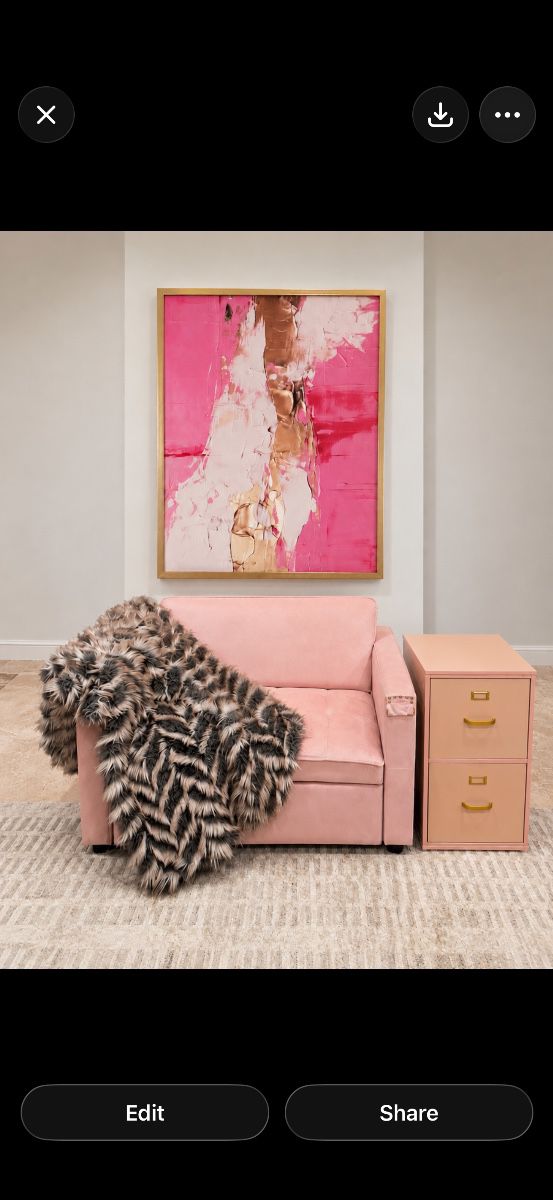 Blush pink accent chair, oversized contemporary abstract art, faux fur throw blanket, pink filing cabinet, feminine office decor, modern glam furnishings