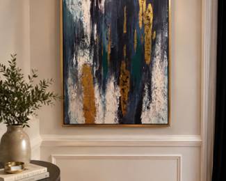 Large framed abstract artwork featuring layered navy, charcoal, teal, white, and metallic gold tones in a modern expressive composition. Gold frame adds warmth and contrast, making it a striking statement piece for entryways, offices, living spaces, or dining rooms. Textured finish with rich depth and movement throughout.