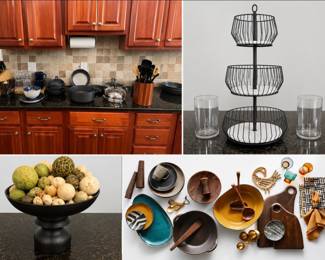 African-inspired kitchen and entertaining pieces including Eric Adjepong for Crate & Barrel dishware, serving pieces, decorative fruit bowls, and contemporary kitchen accessories. Heavy-duty marble fruit basket, tiered countertop organizers, flower vases, cookware, glassware, serving pieces, and additional new and gently used kitchen items available throughout the sale. 
