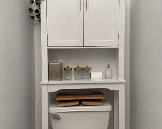 Two over-the-toilet storage cabinets available along with additional floor storage and bathroom organization pieces. Multiple bamboo bathroom/squatty-style stools available in like-new condition. Anthropologie room/bath sprays, heavy crystal bathroom accessories, decorative storage jars, and contemporary bathroom decor available throughout the sale.