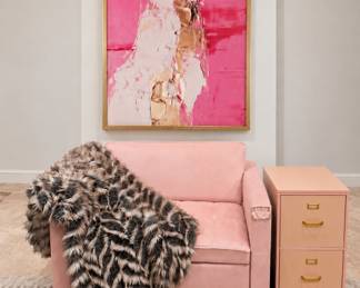 Blush pink accent chair, oversized contemporary abstract art, faux fur throw blanket, pink filing cabinet, feminine office decor, modern glam furnishings