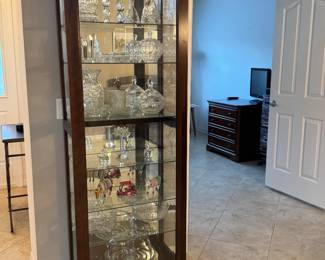 - Tall curio lighted cabinet slide front door with skeleton key 24x15x78 