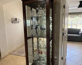 - Tall curio lighted cabinet slide front door with skeleton key 24x15x78 