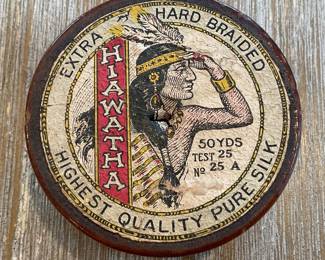 Front of Rare Hiawatha silk fishing line wooden spool