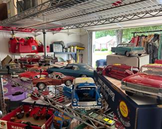 Large collection of antique heavy metal cars