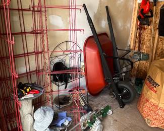 garden shed items - wheelbarrow, garden tools, decor, etc