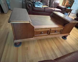 cherry coffee table with center storage drawer and bookcase end