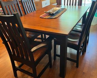 The Amish Store custom made cherry table & 6 chairs - 66Lx42W also has one 24" leaf