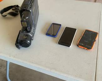 Sharp Slim Cam And Three Phones