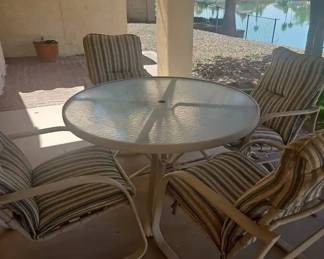 Round Outdoor Glass Umbrella Table With Four Matching Chairs